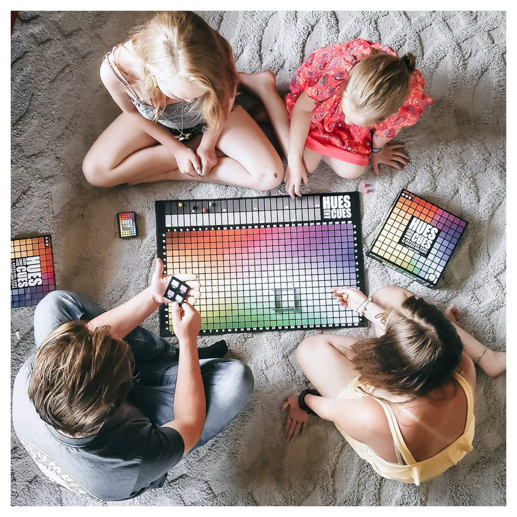 Players enjoying Hues and Cues party game