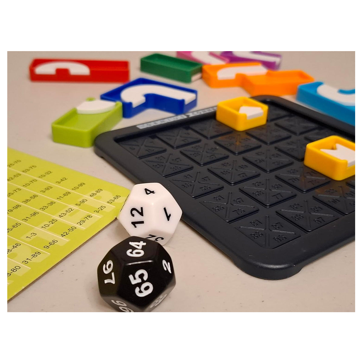 Genius Connection puzzle pieces and dice