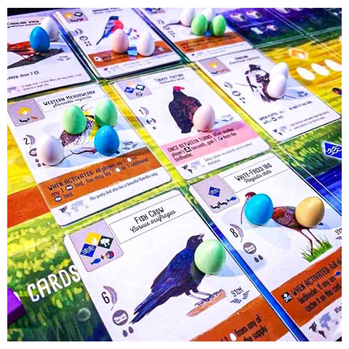 Wingspan gameplay with player mats and bird cards