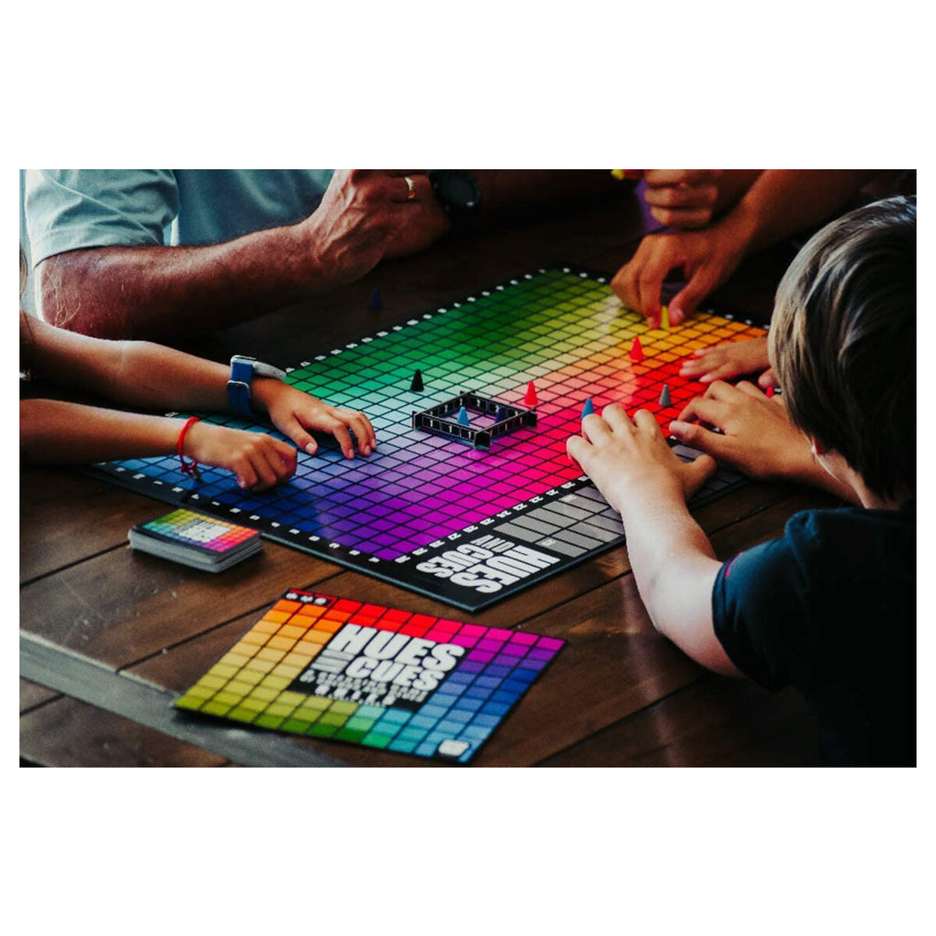 Players enjoying Hues and Cues party game