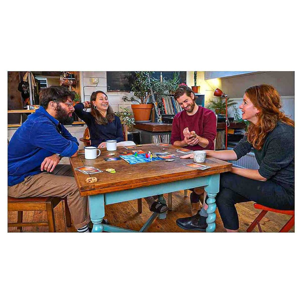 Players enjoying Dixit storytelling game